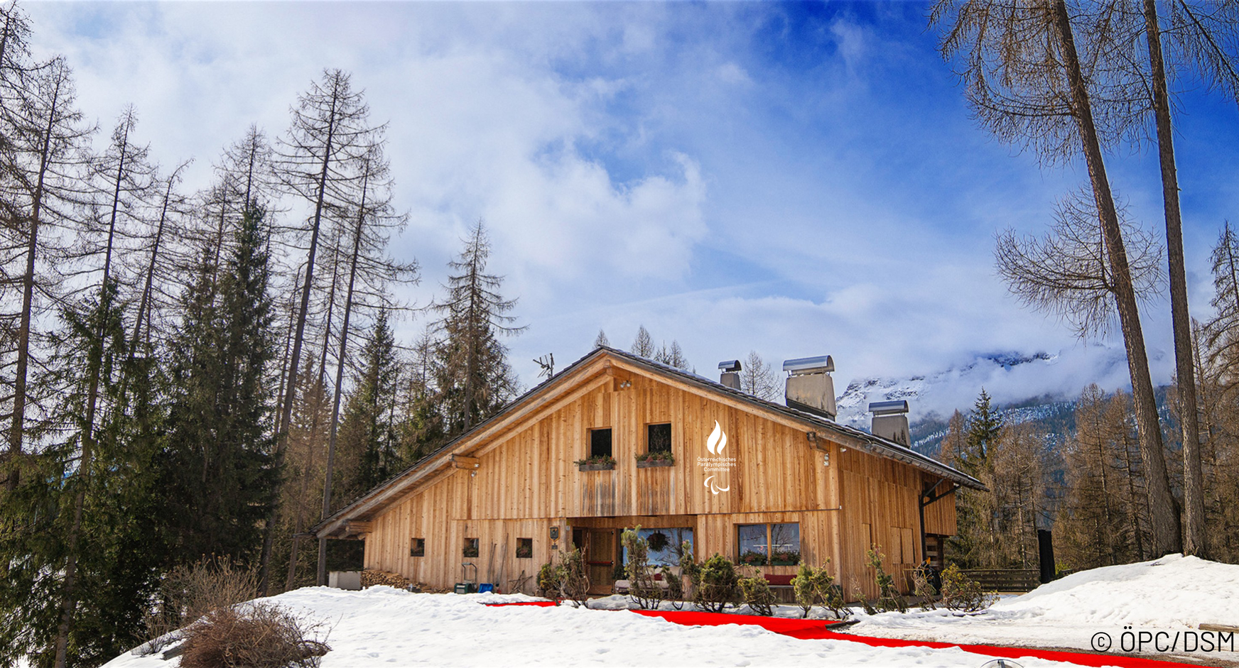 Außenansicht des Österreich-Hauses bei den Paralympics 2026