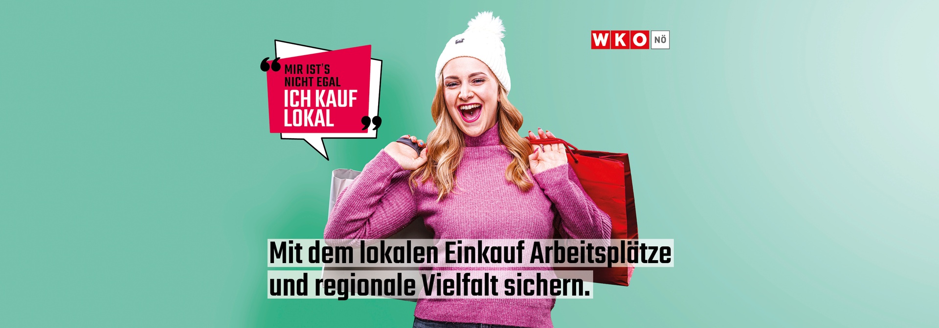 Person in winterlicher Kleidung mit Wollhaube hält mehrere Einkaufstaschen. Links oben steht in einer Sprechblase: „Mir ist’s nicht egal – Ich kauf lokal“. Rechts oben das Logo der WKO Niederösterreich. Unten mittig der Text: „Mit dem lokalen Einkauf Arbeitsplätze und regionale Vielfalt sichern.“