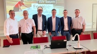 Fotos von der Veranstaltung: Publikum, Vortragende, Gruppenfoto