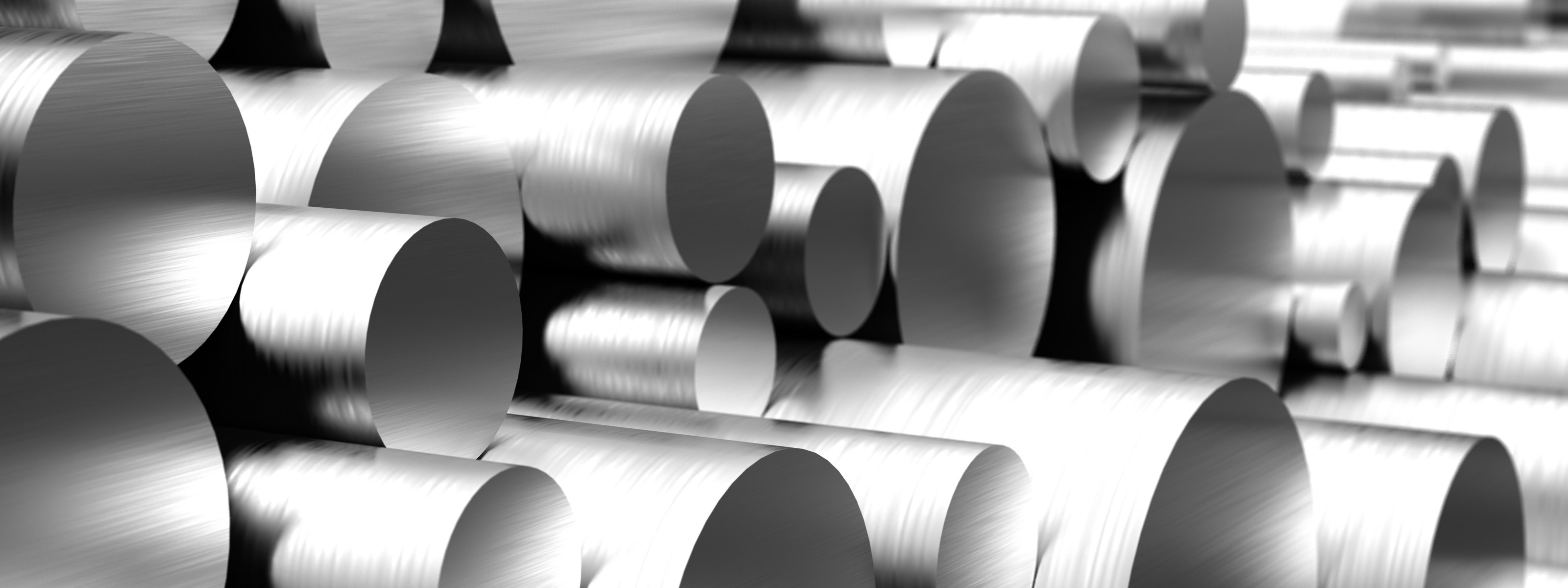 Detailansicht aufeinandergestapelter Metallrohre