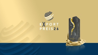 Trophäe und Schriftzug: Exportpreis 26