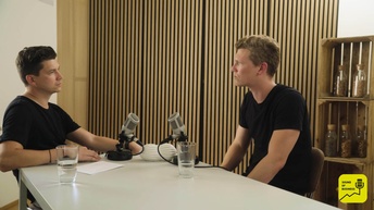 Zwei Männer im Vodcast-Interview