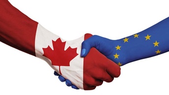 Handschlag der kanadischen und europäischen Flaggen