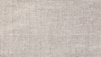 Nahaufnahme eines grauen Baumwollstoffs