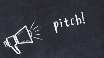 Auf einer Tafel ist ein Lautsprecher aufgemalt und das Wort pitch geschrieben