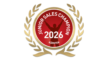 roter Kreis mit goldenem Siegerkranz und Schrift Junior Sales Champion Kärnten 2026
