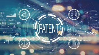 In der Mitte steht das Wort Patent. Dieses ist umgeben von unterschiedlichen Kreisen. Von diesen Kreisen führen vier Striche weg, die jeweils zu einem weiteren umrahmten Symbol führen