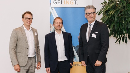 drei Männer stehend