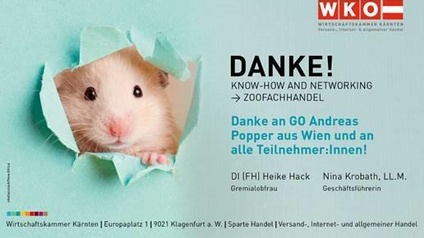 Danke - Know-how und Networking-Abend mit dem Zoofachhandel. Hamster blickt durch ein Loch im türkisen Poster.