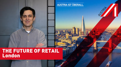 Mann posiert vor Textzug: The Future of Retail - London