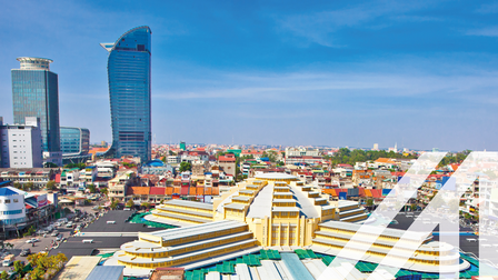 Moderne Architektur mit bunten Häusern im Vordergrund, moderne Wolkenkratzer im Hintergrund.