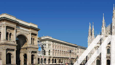 Stadtansicht von Mailand:  Panorama der belebten Piazza del Duomo in Mailand mit dem berühmten Mailänder Dom.  Über das Bild wurde ein weißes Austria A gelegt.