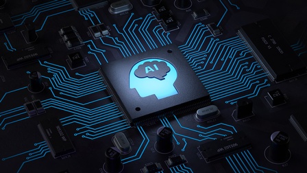 Grafische Darstellung einer Computerplatine, im Zentrum Umriss eines Kopfes in dem Gehirn mit Schriftzug AI abgebildet ist