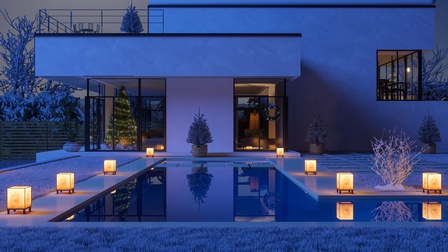 Haus mit Pool und stimmungsvoller Beleuchtung
