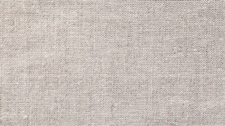 Nahaufnahme eines grauen Baumwollstoffs