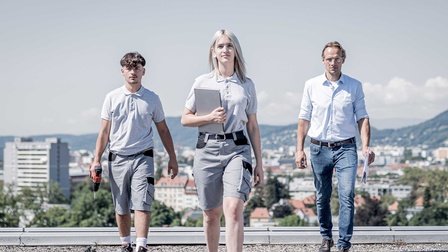 Drei Personen in Frontalansicht