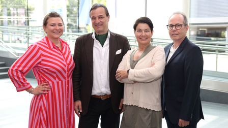 Vier Personen, der Fachverbandsausschuss der Film- und Musikwirtschaft