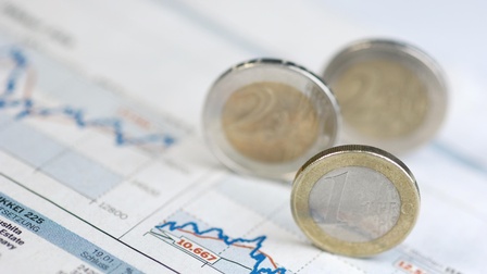 Kurs-Chart mit Euro-Münzen