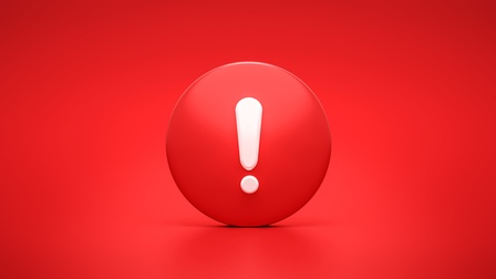 Symbol Rufzeichen vor einem roten Hintergrund