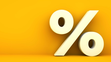 Ein Prozentzeichen vor gelbem Hintergrund