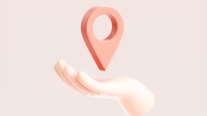 3D Rendering von einer Hand, die ein Standort-Icon-Element hält