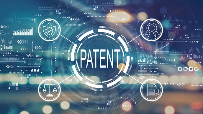 In der Mitte steht das Wort Patent. Dieses ist umgeben von unterschiedlichen Kreisen. Von diesen Kreisen führen vier Striche weg, die jeweils zu einem weiteren umrahmten Symbol führen