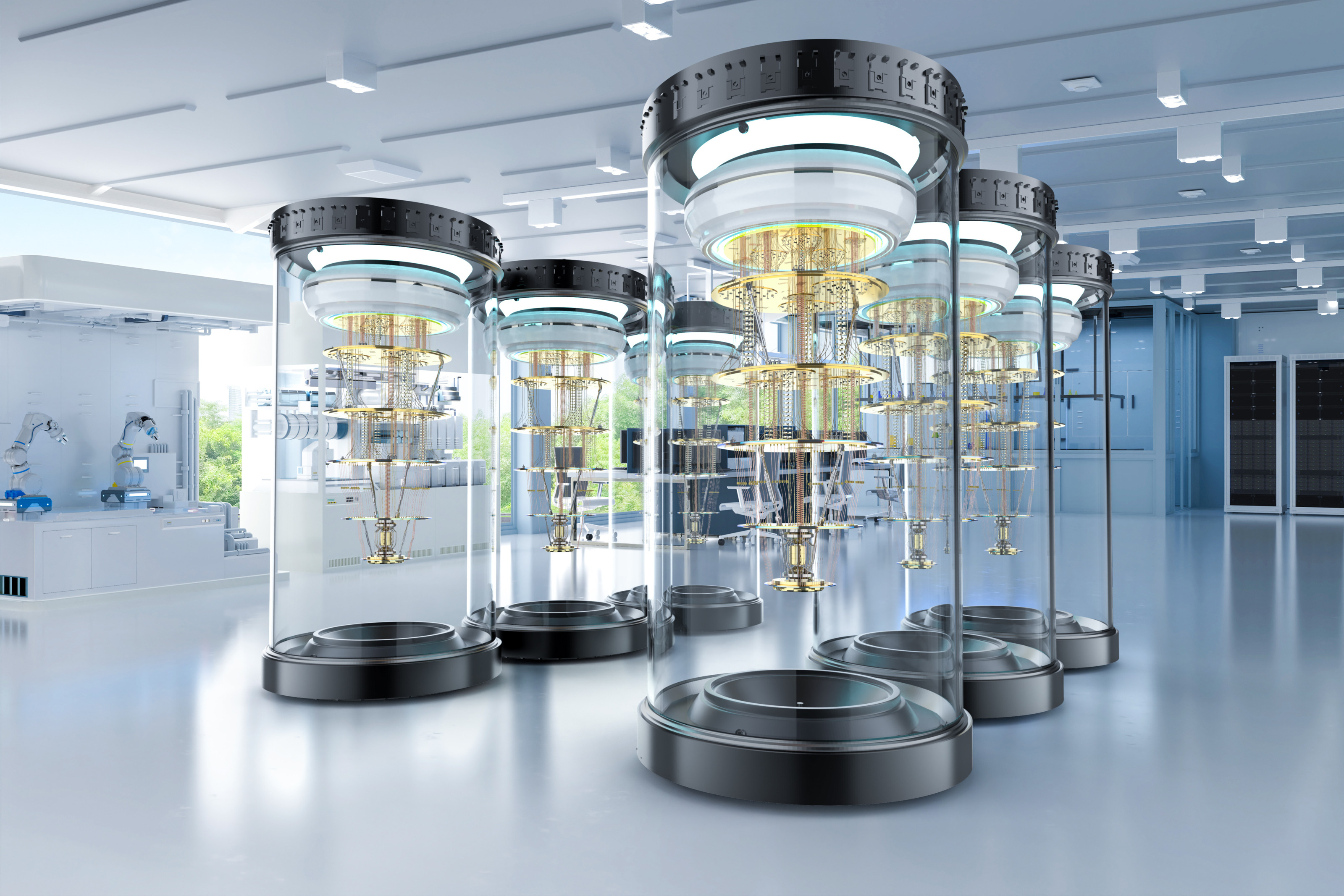 Mehrere Quantencomputer in einem Raum: Die Computer stehen in hohen gl&auml;sernen R&ouml;hren.