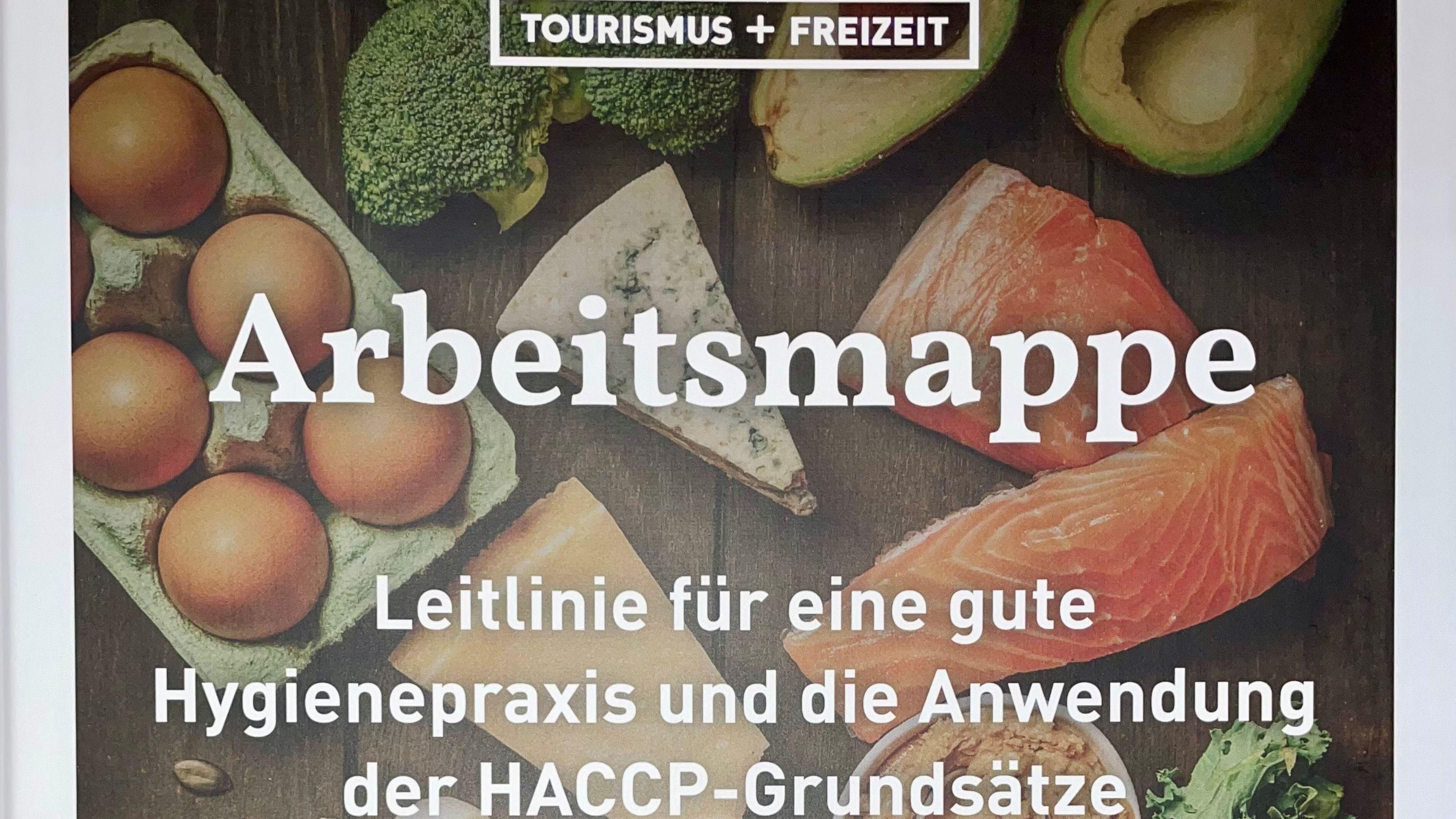 Das Wort Arbeitsmappe vor einigen Lebensmitteln.