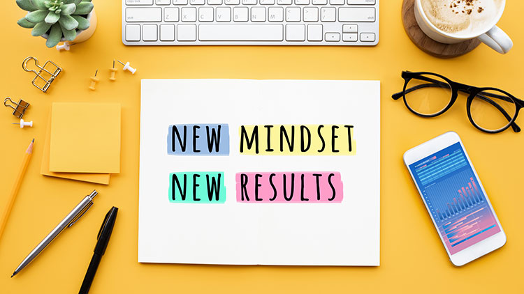 New mindset new results concepts with text on notepad on desk. positive thinking