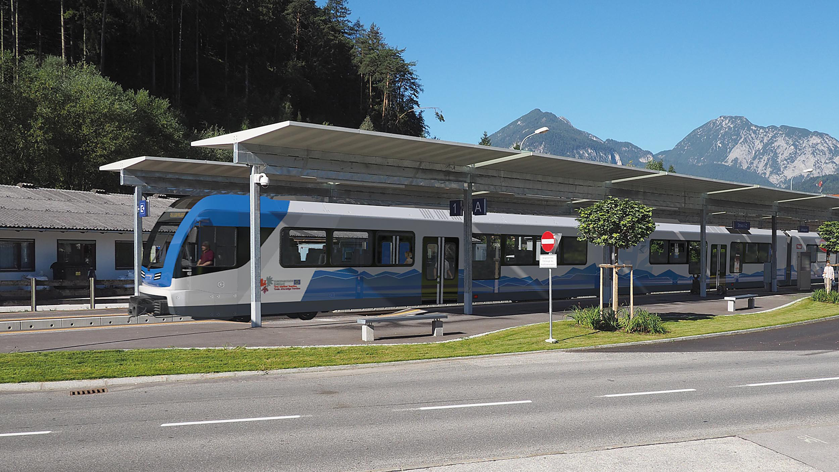 Zug steht in Station, Hintergrund Berge