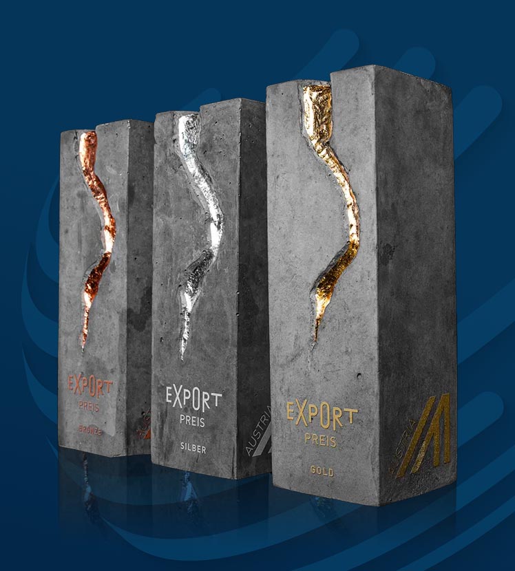 Drei Troph&auml;en aus Beton mit Gold-, Silber- und Bronzeeinschl&uuml;ssen