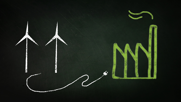 Tafel mit gezeichneten Windr&auml;dern, Stromkabel und gr&uuml;ner Fabrik