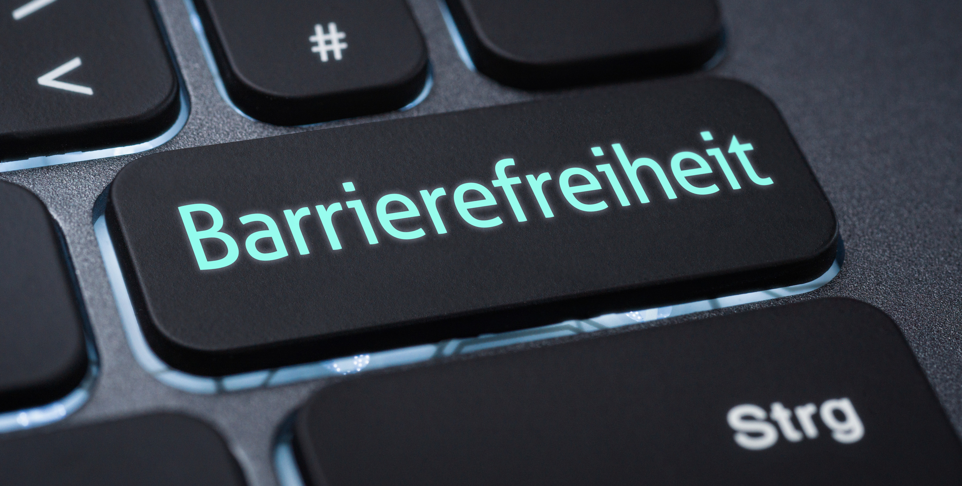 Fokus auf eine Taste einer Tastatur mit Schriftzug Barrierefreiheit